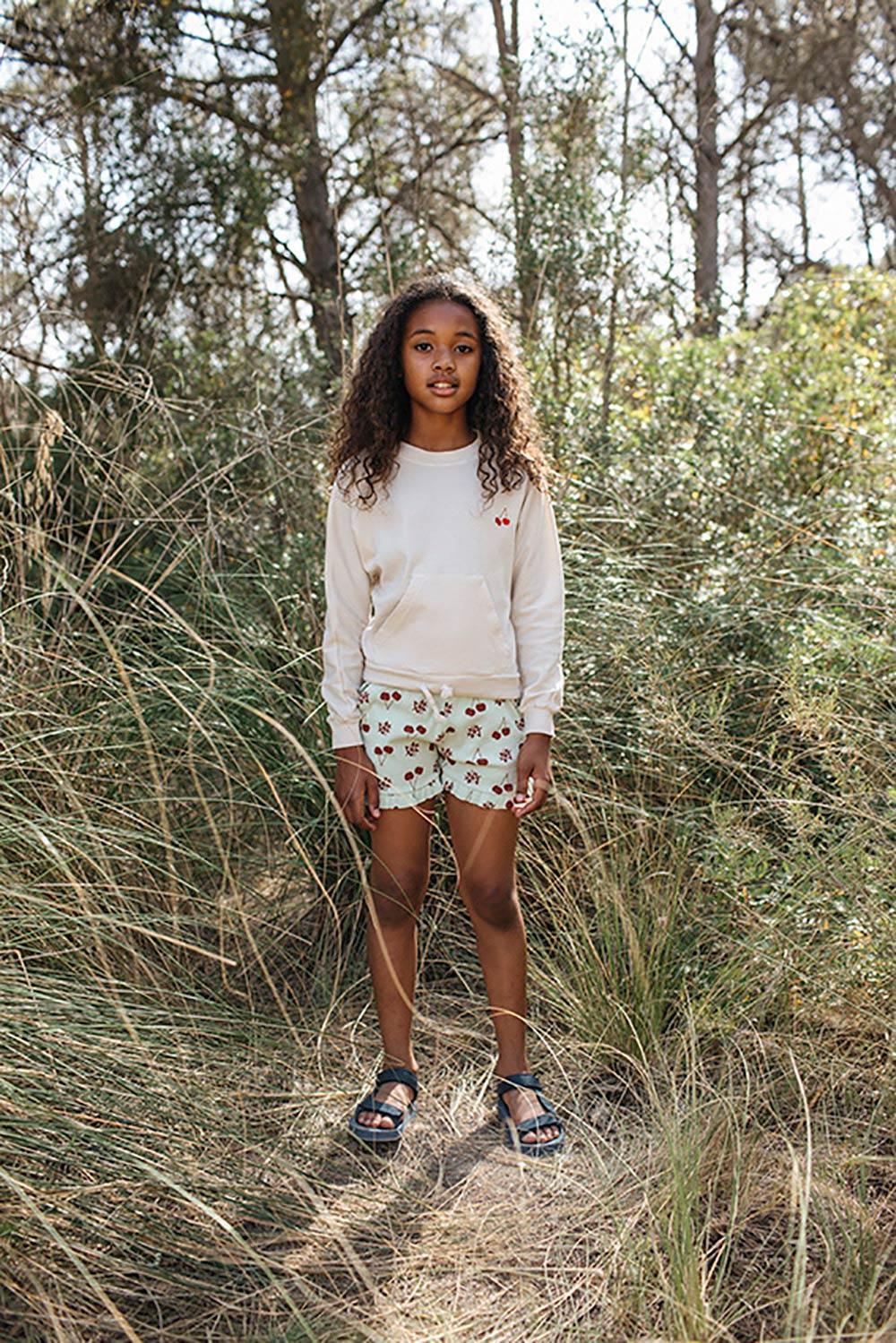 GREEN CHERRY PRINT RUFFLED PANTS
