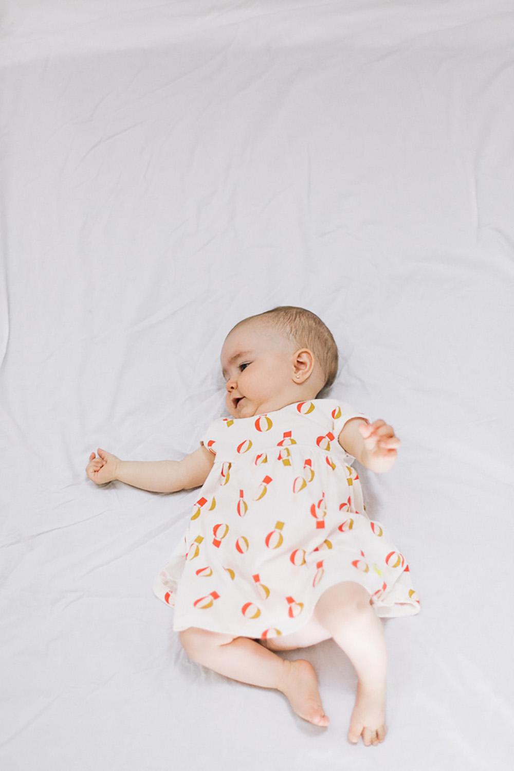 WHITE BABY DRESS WITH COLORFUL BALLOON PRINT
