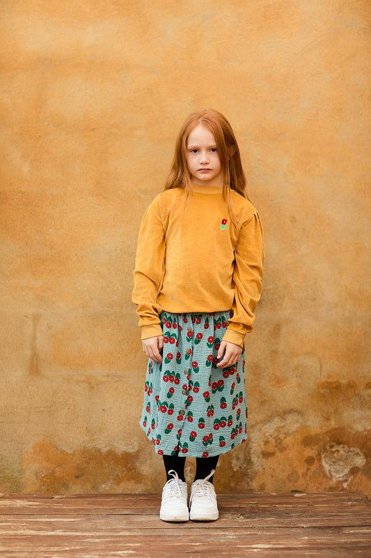 BLUE SKIRT WITH RED FLOWER PRINT