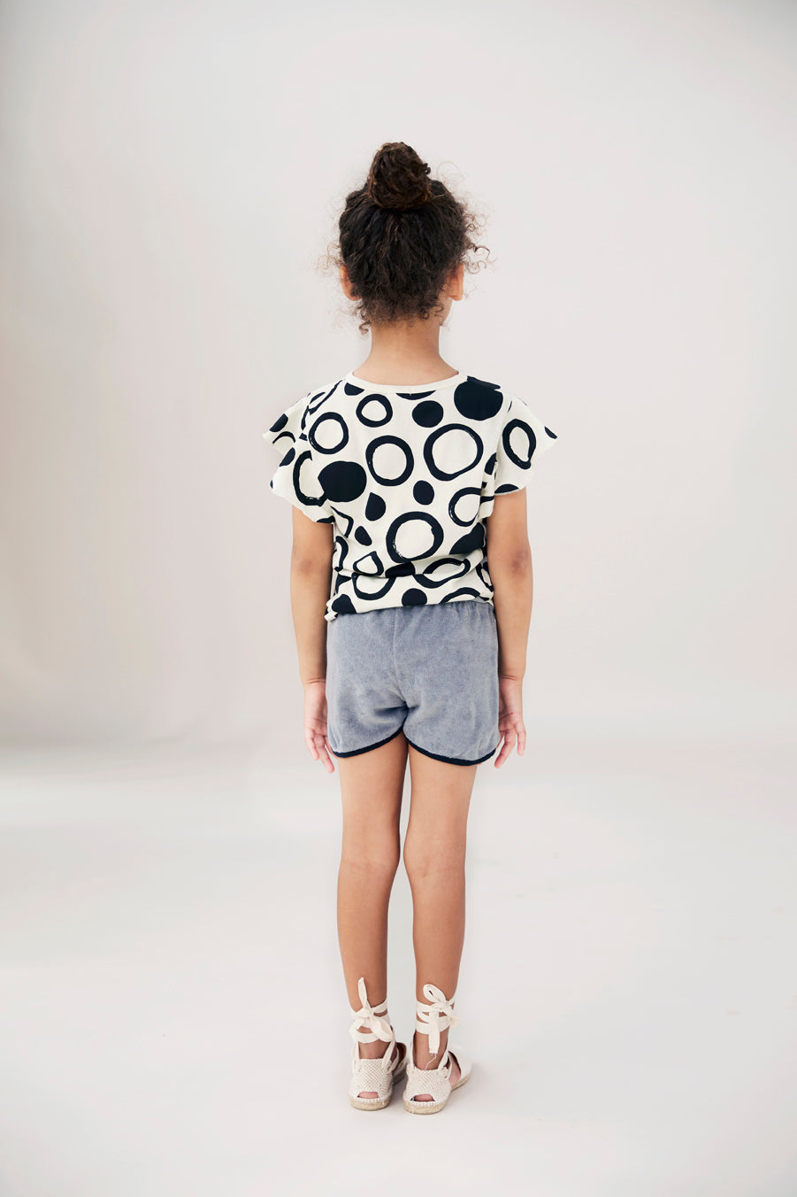 WHITE DOTS PRINTED RUFFLED T-SHIRT