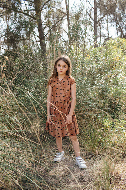 BROWN NOTES AND PENTAGRAM PRINTED BELT DRESS